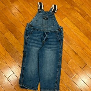 Like New Oshkosh toddler Jean overalls with red, white blue straps, size 2T